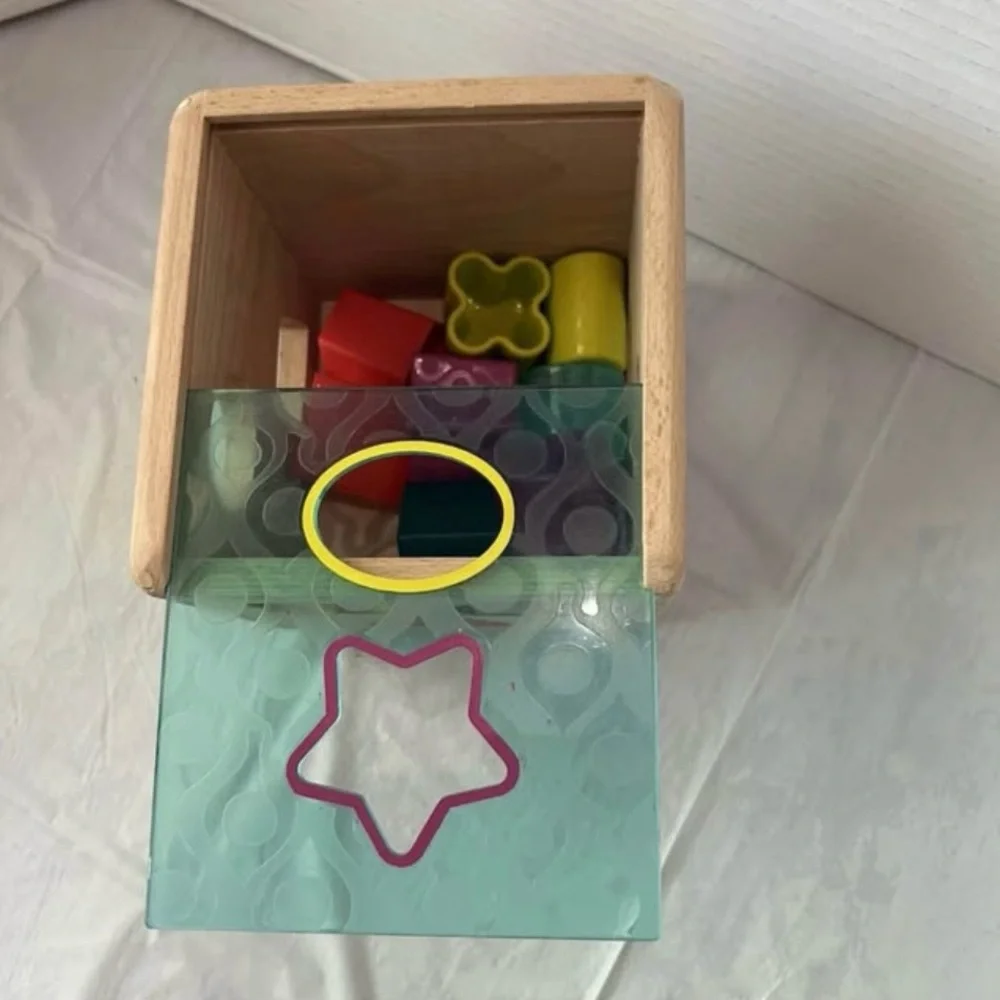 B. Toys Wooden Shape Sorting Cube Toy with 9 Shapes